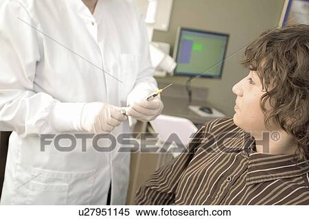 Boy about to get needle View Large Photo Image Stock Photography - Boy about to get needle. Fotosearch