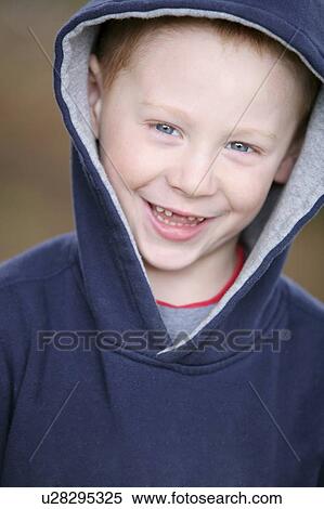 Stock Photography - Boy in blue sweater. Fotosearch