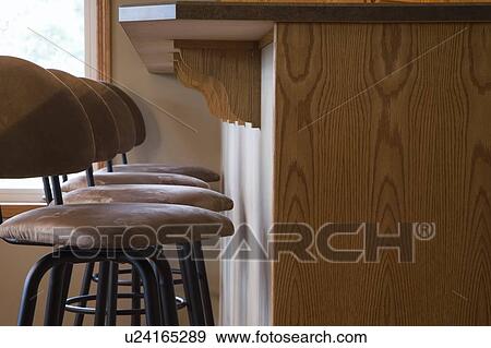 Chairs and raised counter View Large Photo Image Stock Photo - Chairs and raised counter. Fotosearch