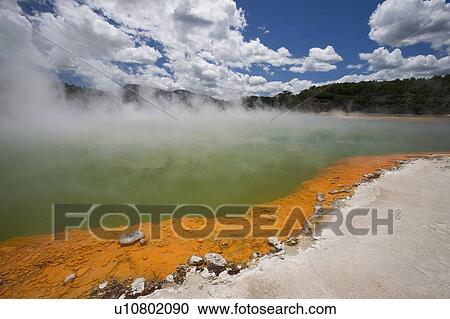 Champagne Pool at geothermal site, Wai-O-Tapu Thermal Wonderland on North Island of New Zealand View Large Photo Image Stock Image - Champagne Pool at geothermal site, Wai-O-Tapu Thermal Wonderland on North Island of New Zealand. Fotosearch