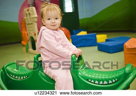 Child playing View Large Photo Image Stock Image - Child playing. Fotosearch
