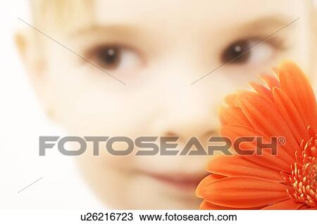 Child with flower View Large Photo Image Stock Image - Child with flower. Fotosearch