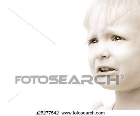 Stock Image - Child with sad face. Fotosearch