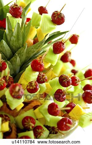Close up of fruits on sticks View Large Photo Image Picture - Close up of fruits on sticks. Fotosearch