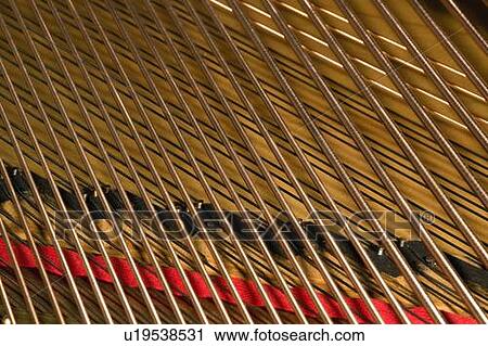 Close up of piano strings View Large Photo Image Stock Image - Close up of piano strings. Fotosearch
