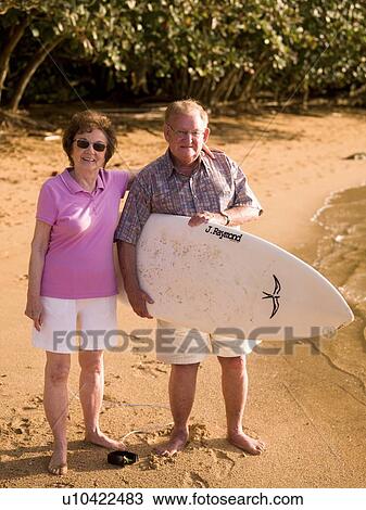 Couple on the beach View Large Photo Image Stock Image - Couple on the beach. Fotosearch