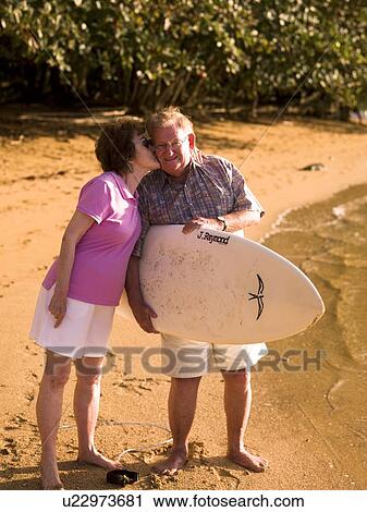Couple on the beach View Large Photo Image Stock Image - Couple on the beach. Fotosearch