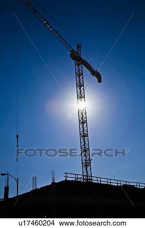 Crane on a construction site View Large Photo Image Picture - Crane on a construction site. Fotosearch