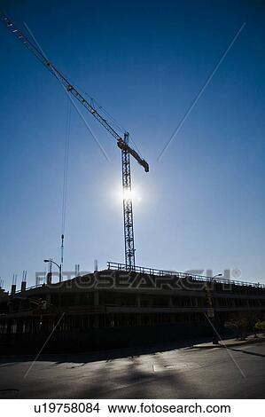Crane on a construction site View Large Photo Image Picture - Crane on a construction site. Fotosearch