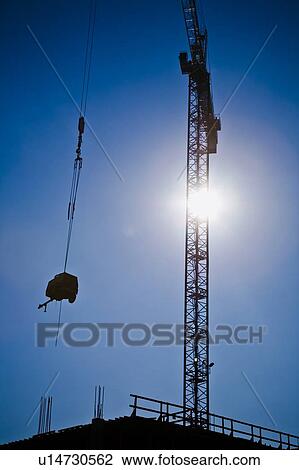 Crane on a construction site View Large Photo Image Stock Image - Crane on a construction site. Fotosearch