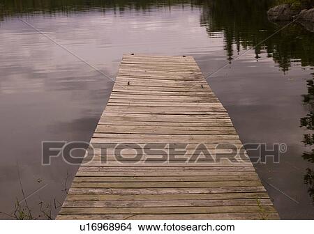 Dock on a lake View Large Photo Image Picture - Dock on a lake. Fotosearch