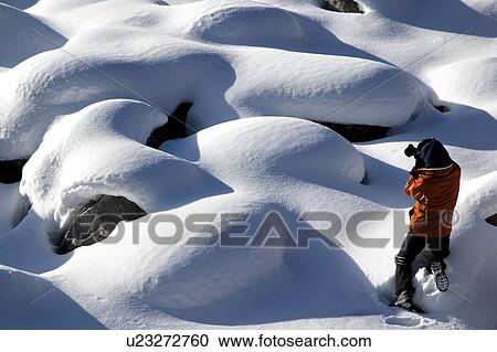 Stock Image - Female photographer, Jasper National Park, Alberta, Canada. Fotosearch