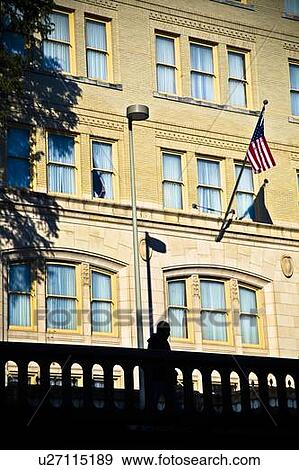 Stock Photo - Flag hanging from a building, San Antonio, Texas, USA. Fotosearch