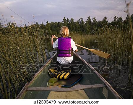 Girl canoeing View Large Photo Image Stock Photo - Girl canoeing. Fotosearch