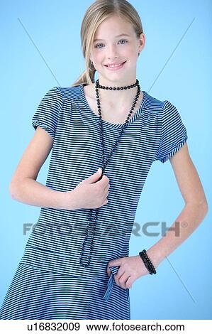 Stock Photo - Girl in blue dress. Fotosearch