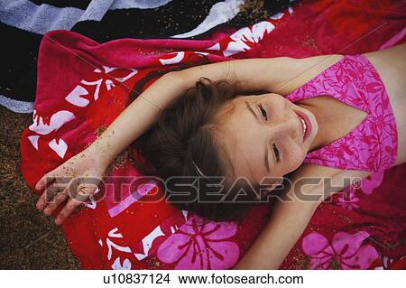 Picture - Girl on the beach. Fotosearch