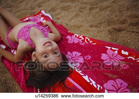 Girl on the beach View Large Photo Image Stock Photograph - Girl on the beach. Fotosearch