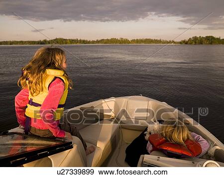 Girls on a boat View Large Photo Image Stock Photo - Girls on a boat. Fotosearch