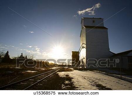 Grain elevator by railroad track View Large Photo Image Stock Photography - Grain elevator by railroad track. Fotosearch