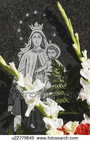 Gravestone with flowers View Large Photo Image Stock Photo - Gravestone with flowers. Fotosearch