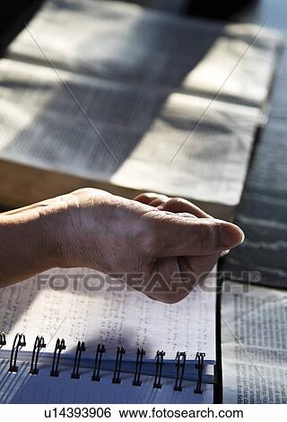 Stock Photograph - Hand holding something. Fotosearch