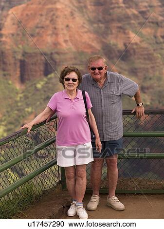 Stock Image - Happy couple, Waimea Canyon State Park, Kauai, Hawaii . Fotosearch