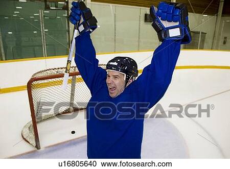Hockey player celebrating a goal View Large Photo Image Stock Image - Hockey player celebrating a goal. Fotosearch