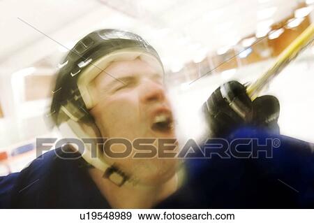 Hockey player getting checked from behind View Large Photo Image Stock Photo - Hockey player getting checked from behind. Fotosearch