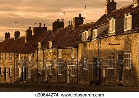 Houses at dusk, Thaornton Le Dale, Yorkshire, England View Large Photo Image Picture - Houses at dusk, Thaornton Le Dale, Yorkshire, England. Fotosearch