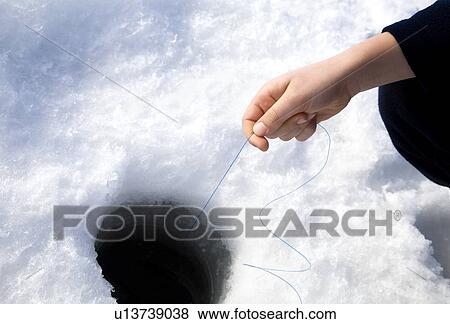 Ice fishing View Large Photo Image Stock Photo - Ice fishing. Fotosearch