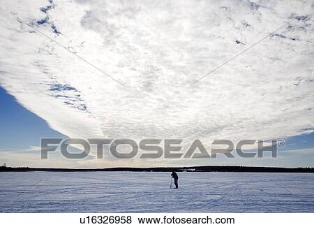 Ice fishing View Large Photo Image Stock Photo - Ice fishing. Fotosearch