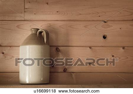 Jug on a shelf View Large Photo Image Stock Photo - Jug on a shelf . Fotosearch
