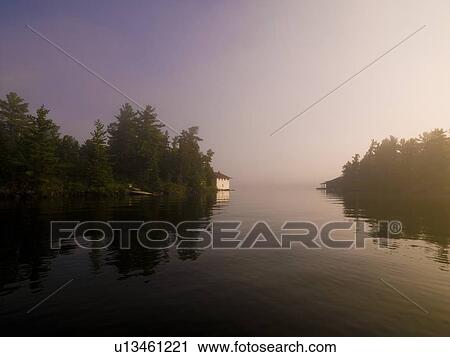 Lake of the Woods, Ontario, Canada, Peaceful setting on a lake View Large Photo Image Stock Image - Lake of the Woods, Ontario, Canada, Peaceful setting on a lake. Fotosearch