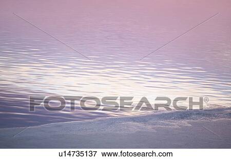 Lakeshore at sunrise View Large Photo Image Stock Photo - Lakeshore at sunrise. Fotosearch