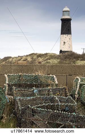 Picture - Lighthouse and lobster traps, Humberside, England. Fotosearch