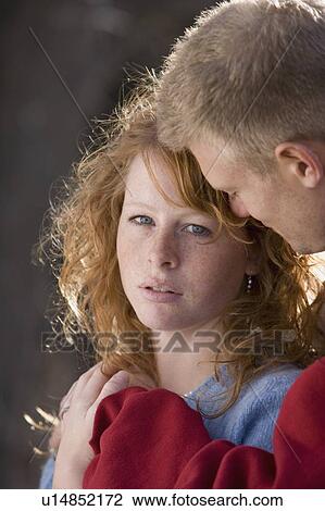 Man comforting a woman View Large Photo Image Stock Image - Man comforting a woman. Fotosearch
