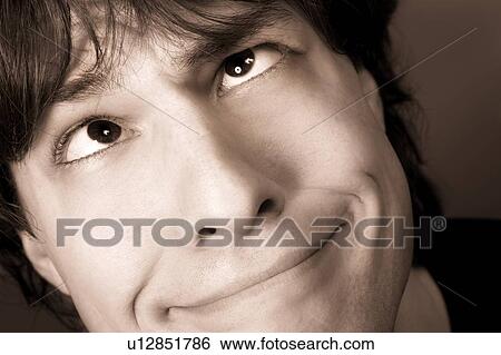Man making goofy face View Large Photo Image Stock Photograph - Man making goofy face. Fotosearch