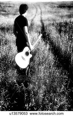 Man with guitar View Large Photo Image Stock Image - Man with guitar. Fotosearch