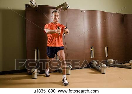 Man working out View Large Photo Image Stock Image - Man working out. Fotosearch