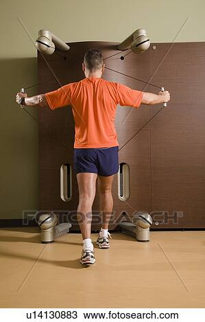 Man working out View Large Photo Image Stock Image - Man working out. Fotosearch