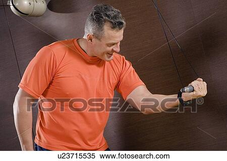 Stock Photography - Man working out. Fotosearch