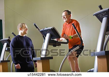 Men at the gym View Large Photo Image Stock Image - Men at the gym. Fotosearch