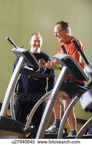Stock Photography - Men at the gym. Fotosearch