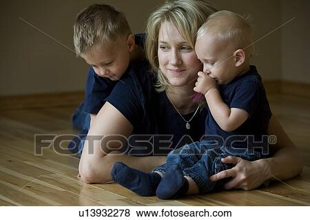 Stock Photo - Mother and two sons. Fotosearch