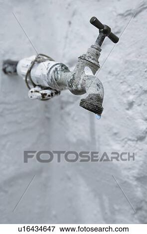 Old tap leaking water View Large Photo Image Stock Photo - Old tap leaking water . Fotosearch