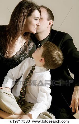 Stock Image - Parents with son. Fotosearch