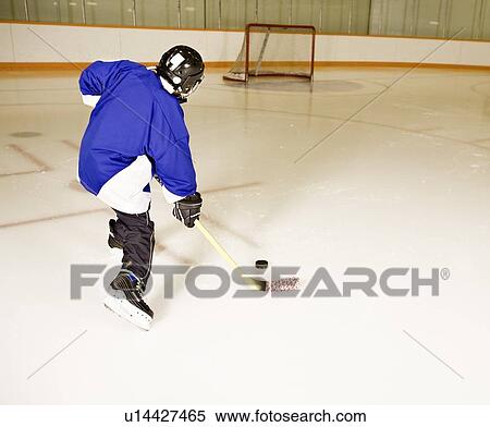 Person playing hockey View Large Photo Image Stock Photography - Person playing hockey. Fotosearch