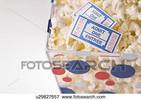 Popcorn bowl with movie tickets View Large Photo Image Stock Photo - Popcorn bowl with movie tickets . Fotosearch
