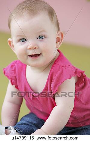 Stock Photography - Portrait of a baby girl. Fotosearch