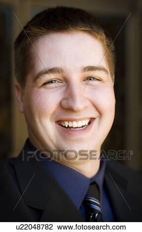 Portrait of a man in a suit View Large Photo Image Stock Image - Portrait of a man in a suit. Fotosearch
